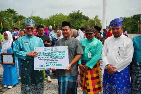 BERSAAN HUT KABUPATEN SIAK ke 25 tahun, BAZNAS SALURKAN BANTUAN KEPADA 717 Mustahik 